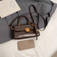 Bolsa Tiracolo Cassia™ - Compacta e Versátil