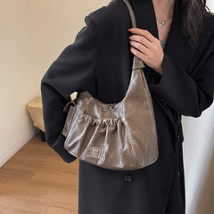 Bolsa Tiracolo Noelle™ -