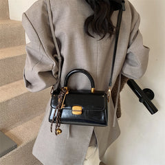 Bolsa Tiracolo Cassia™ - Compacta e Versátil