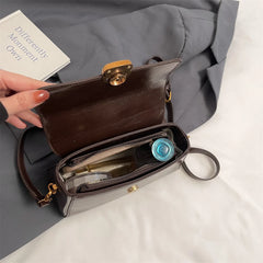 Bolsa Tiracolo Cassia™ - Compacta e Versátil