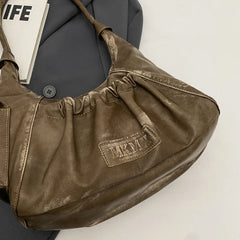 Bolsa Tiracolo Noelle™ -